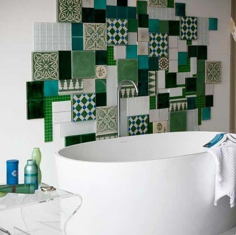 Indridible bathroom with colorful wall, white bethup to look cool