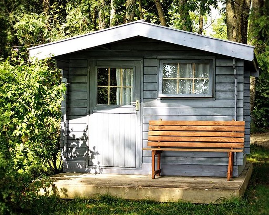 Log cabin garden shed in light blue