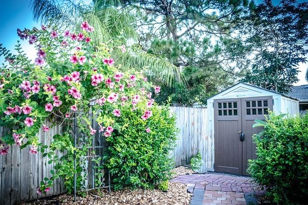 Natural shed design with flower on the front