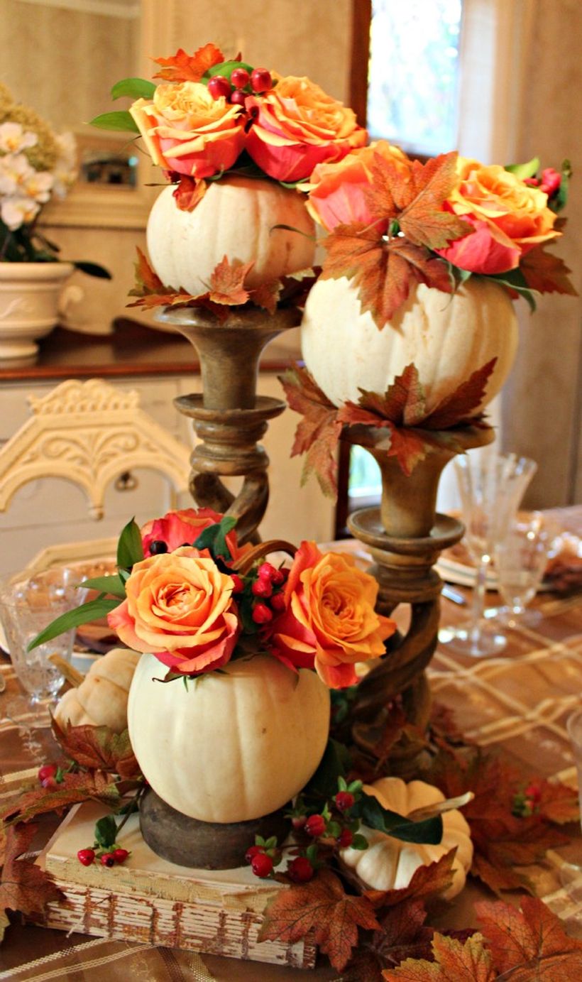 Patterned-tablecloth-and-white-pumpkin-and-red-yellow-flowers-