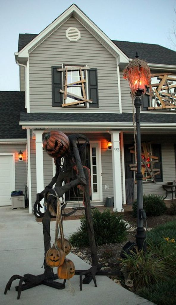 Perfect outdoor decorating for garden with menacing pumpkin man to make your spooky outdoor decoration