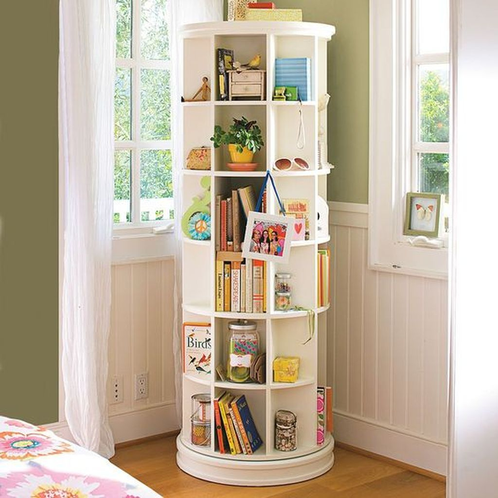 Perfect small bedroom ideas with revolving bookshelf at the corner to beautify your bedroom design