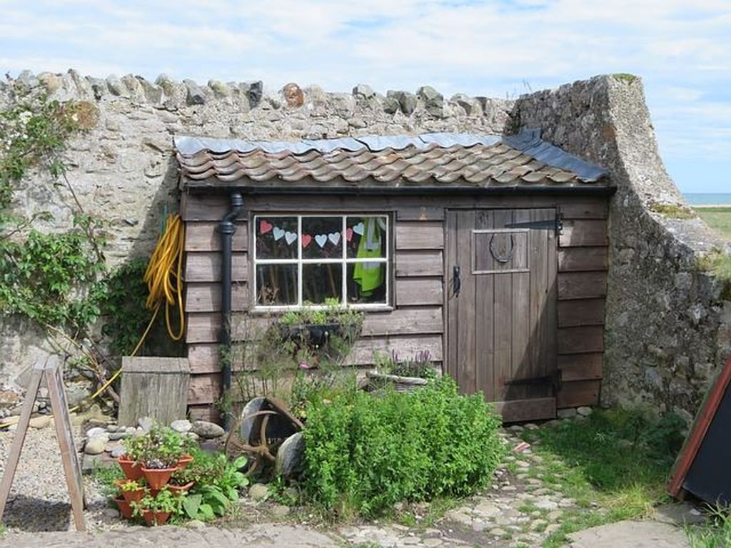 Small wooden shed to organize your home