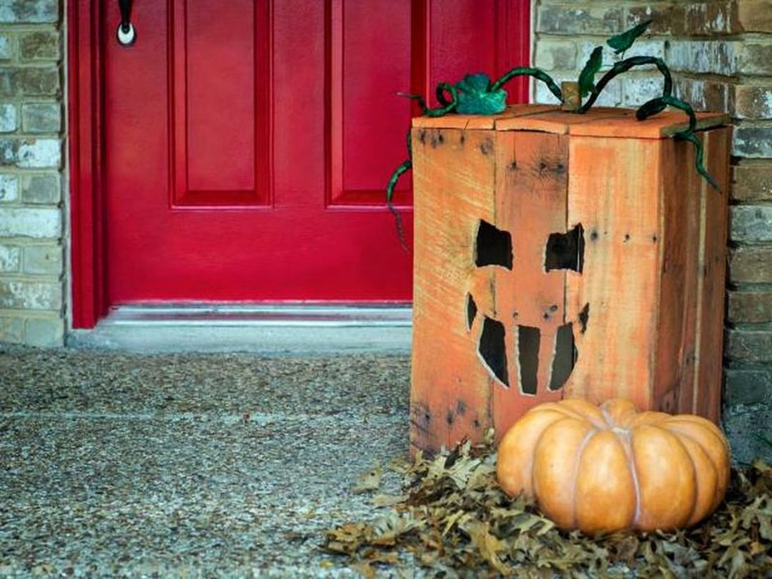 Square orange halloween lanterns from wooden pallets for home decoration