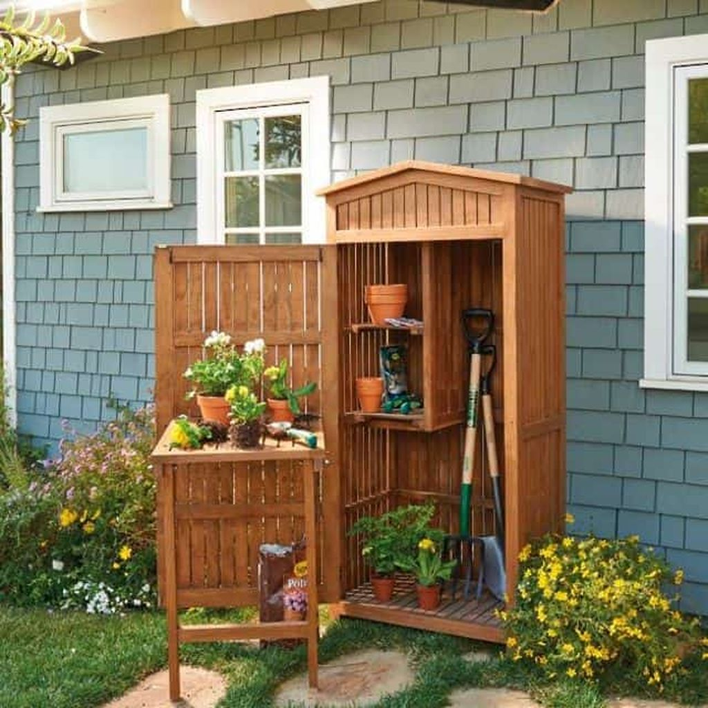 Teak storage shed for garden