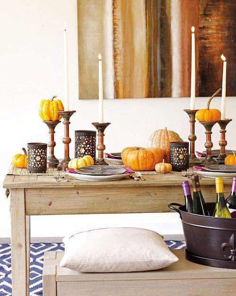 Thanksgiving-for-table-with-candles-and-pumpkins.-