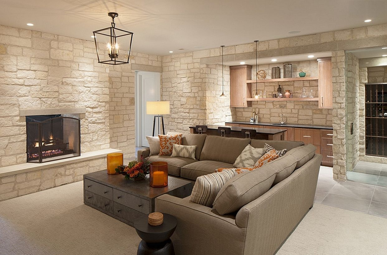 Basement hangout with bar, wine cellar, and gray latter l sofa