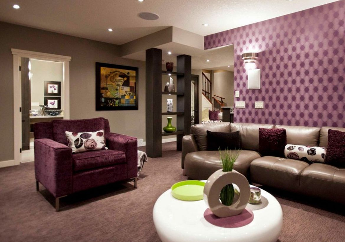 Basement living room with small roun table, sofa and unique wall ideas