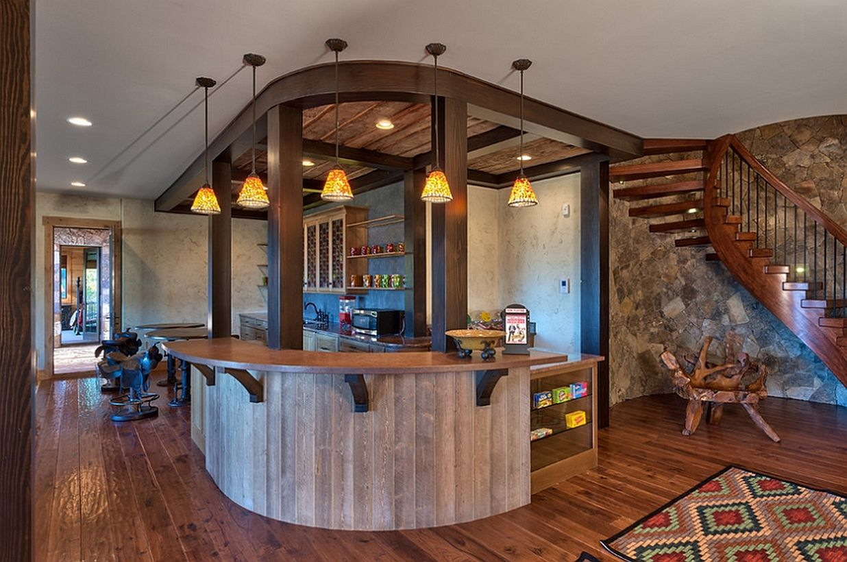 Basement with wooden bar and hanging lamps