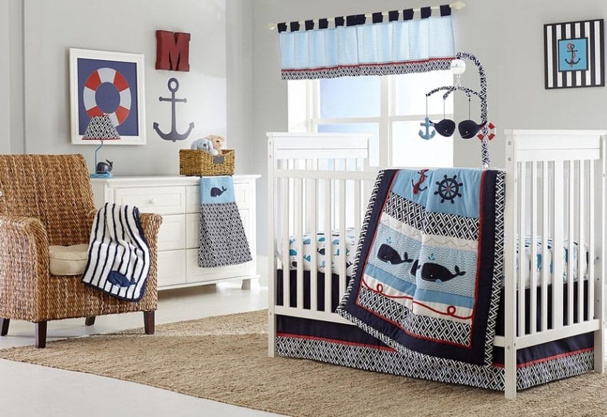 Cute-nursery-for-baby-boys-with-whale-themed-in-terms-of-blankets-bed-sheets-towels-and-toys-for-your-baby