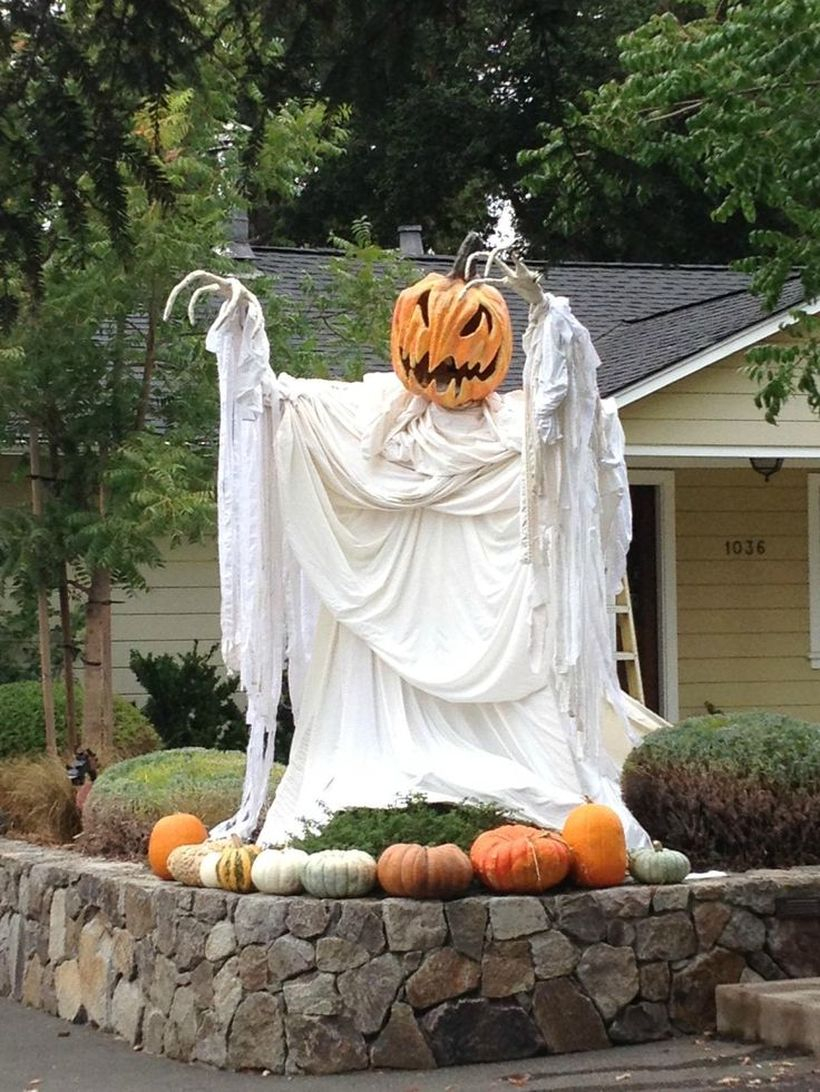 Ghost creepy with his head from pumpkin