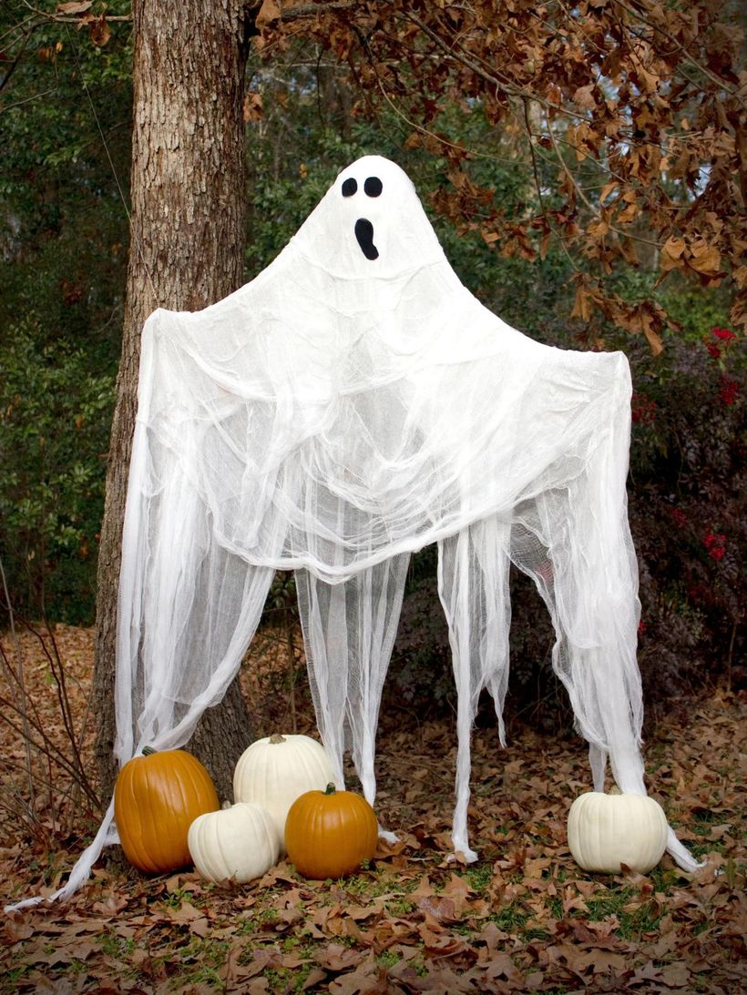 Ghost halloween with pumpkins
