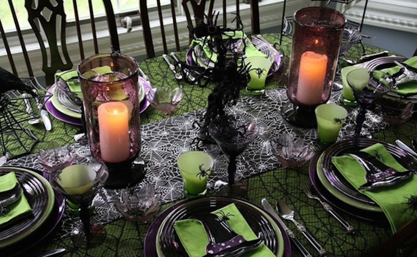 Halloween dinner setting with spiderwebs