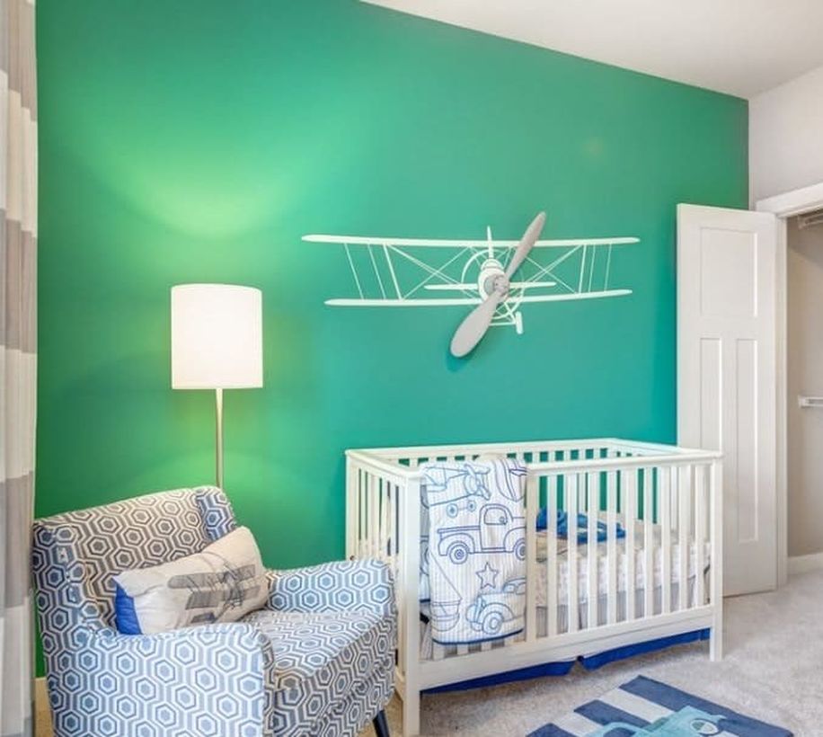 Simple-nursery-for-baby-boys-with-miniature-airplane-for-decoration-wall-and-floor-lamp-to-decorative-lighting