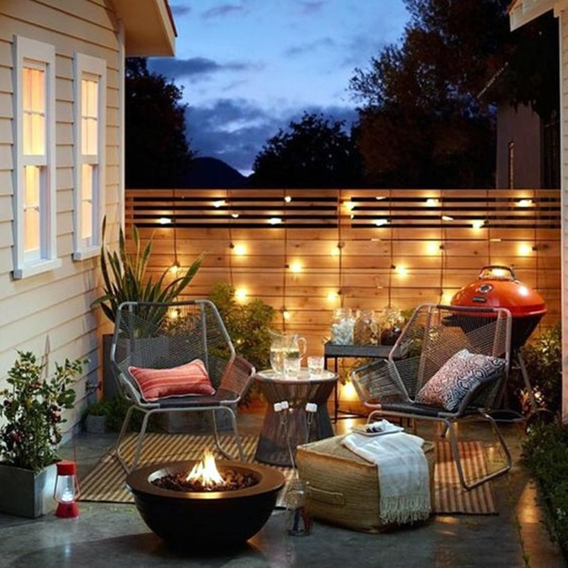 String lamps on the wooden fence