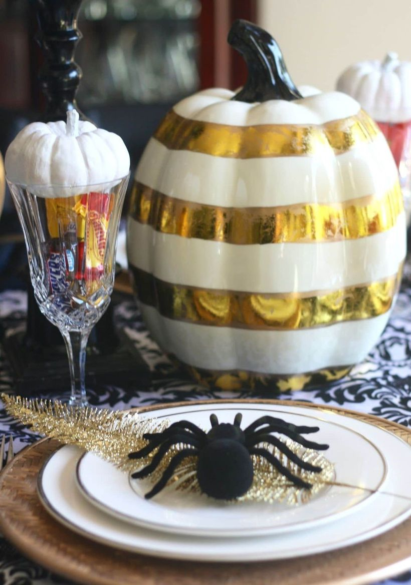White and gold pumpkin centerpiece