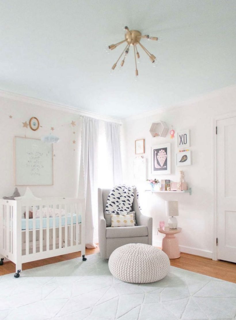 White-cute-baby-girl-room-ideas-with-wooden-white-bed-the-bottom-has-wheels-so-easy-to-move