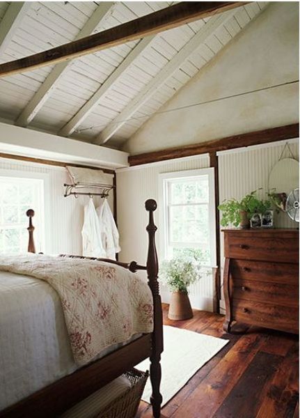 A-white-wooden-ceiling-plus-beams-stained-wooden-furniture.-1