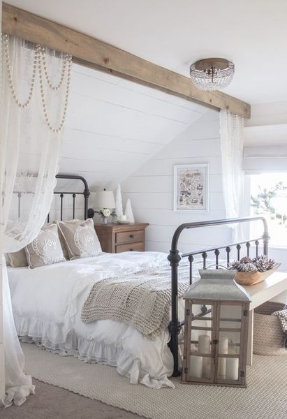 Beads-and-curtains-a-large-candle-lantern-and-neutral-textiles.-1