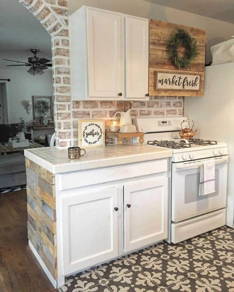 Brick walls combined with white cabinets