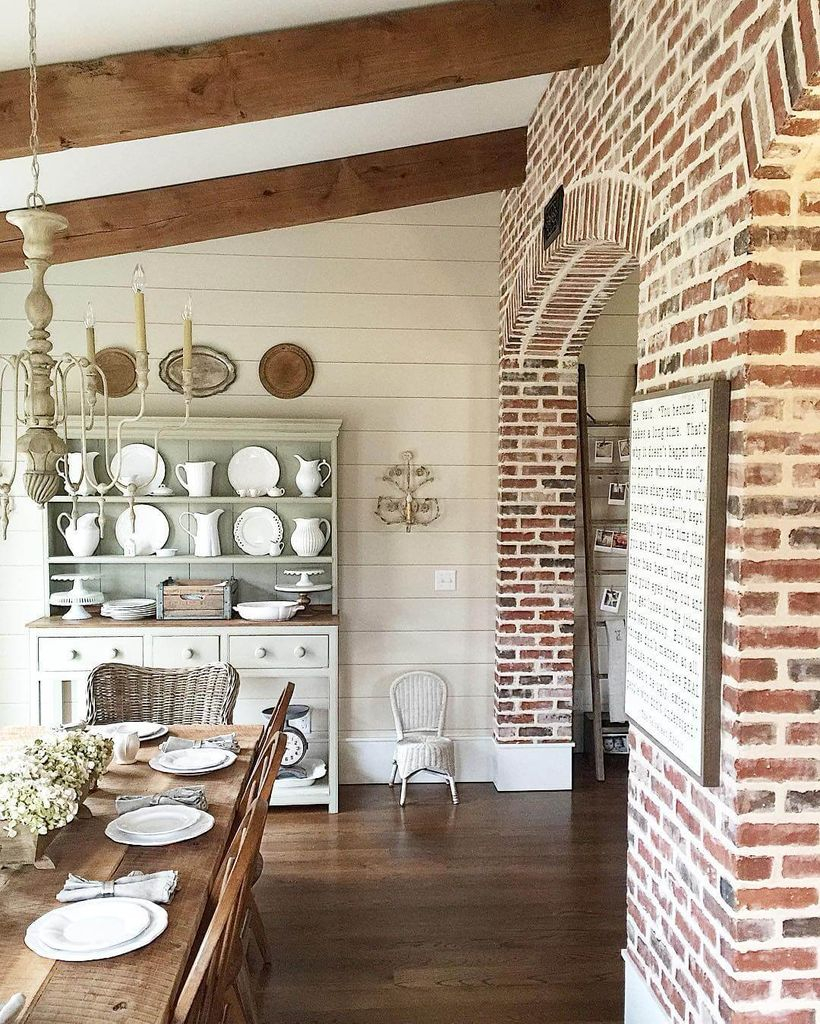 Brick walls combined with wooden floor for farmhouse dining room