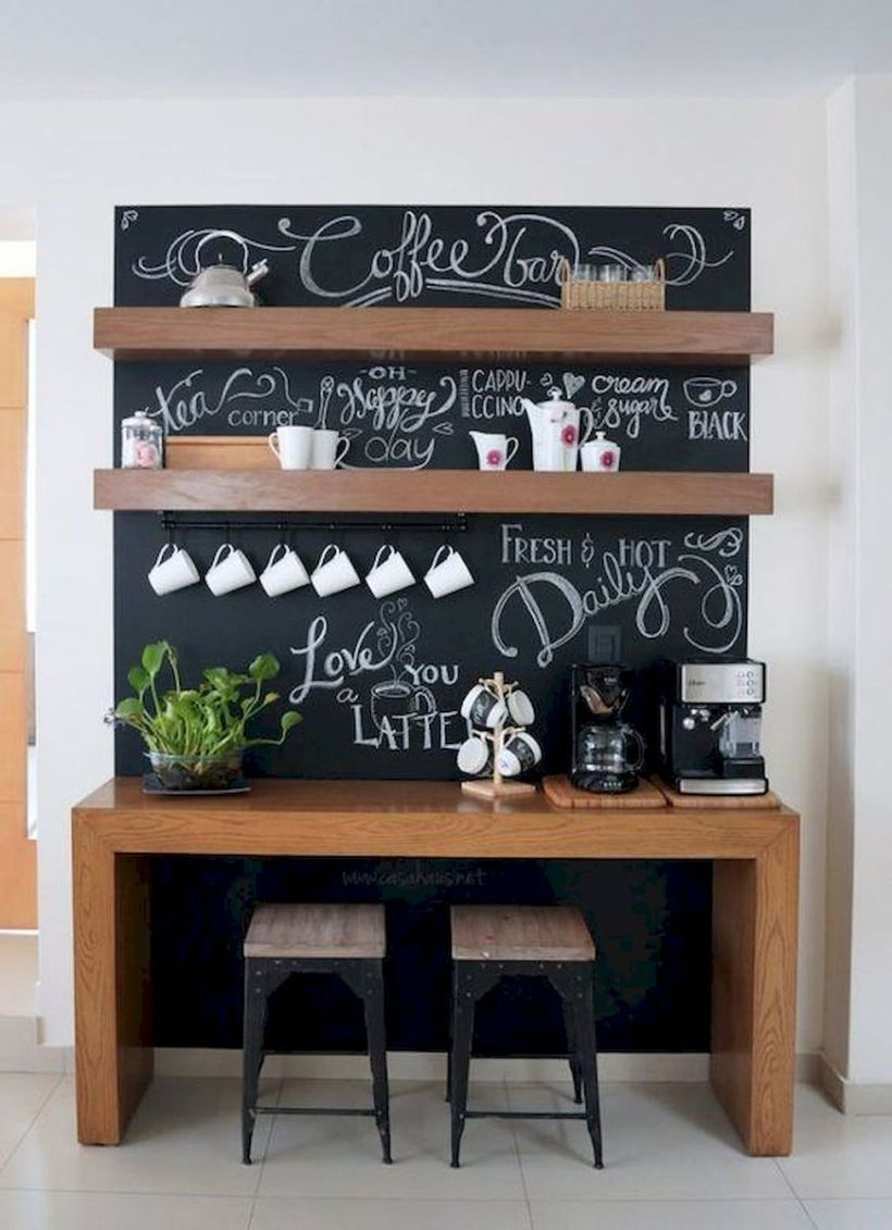Brown wooden coffee bar combined with black board, wooden shelf and small wooden chairs