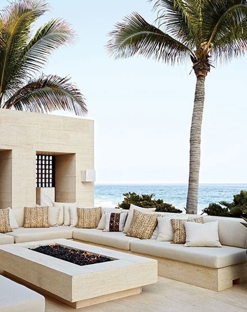 Cozy-seat-with-a-sectional-mod-sofa-and-an-array-of-colorful-pillows-to-gather-with-the-family
