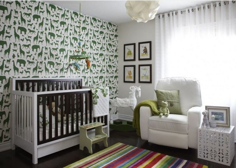 Green-animals-murals-and-wooden-beds-for-kids-room.
