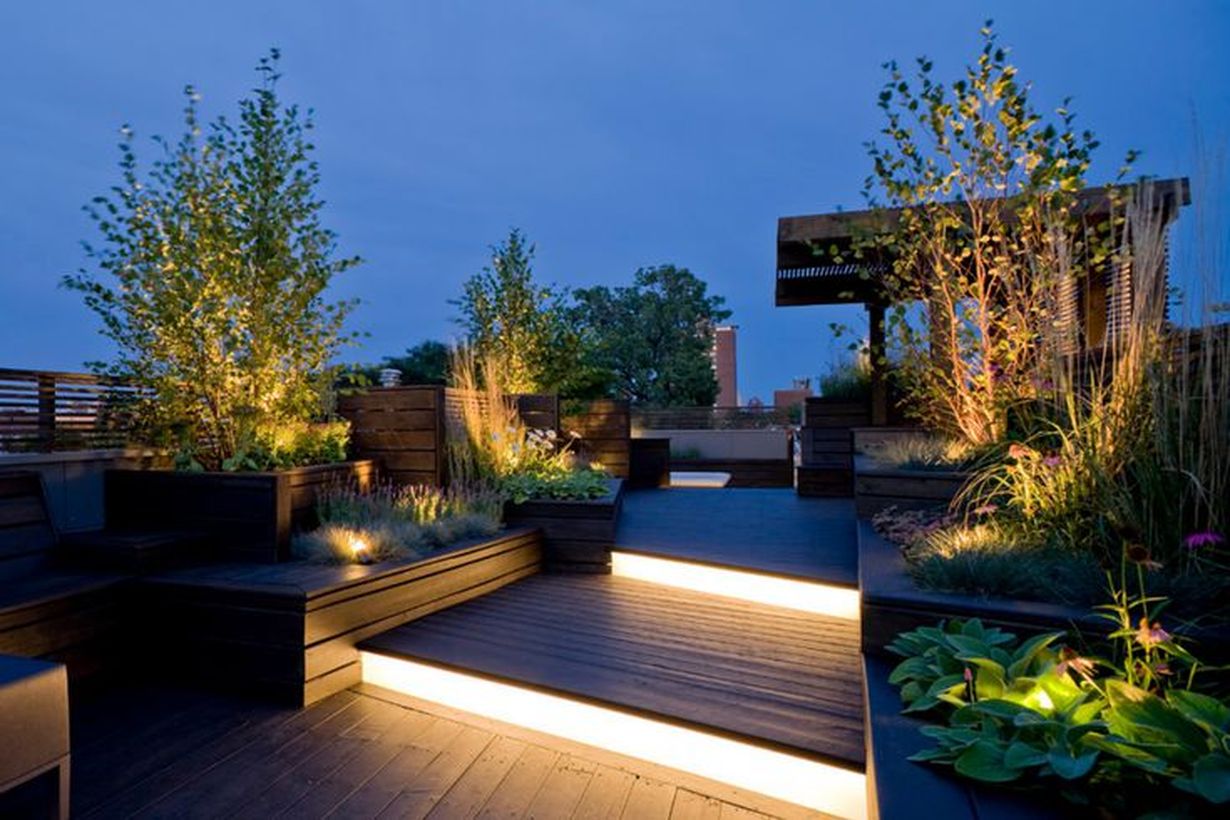 Linear-lighting-on-the-rooftop-with-wooden-pallet-floor-lights-added-to-the-stairs-to-light-up-when-you-walk-and-create-a-comfortable-atmosphere