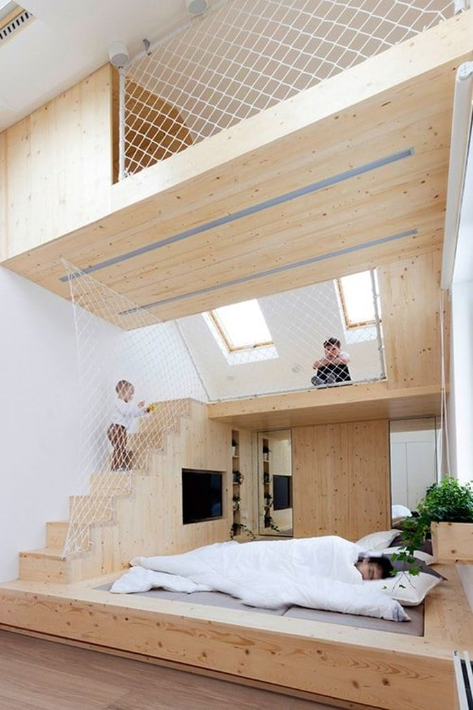 Loft bedroom with wooden walls