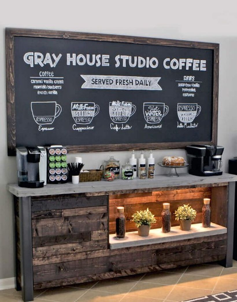 Old wood coffee bar combined with blackboard and potted plants for decoration