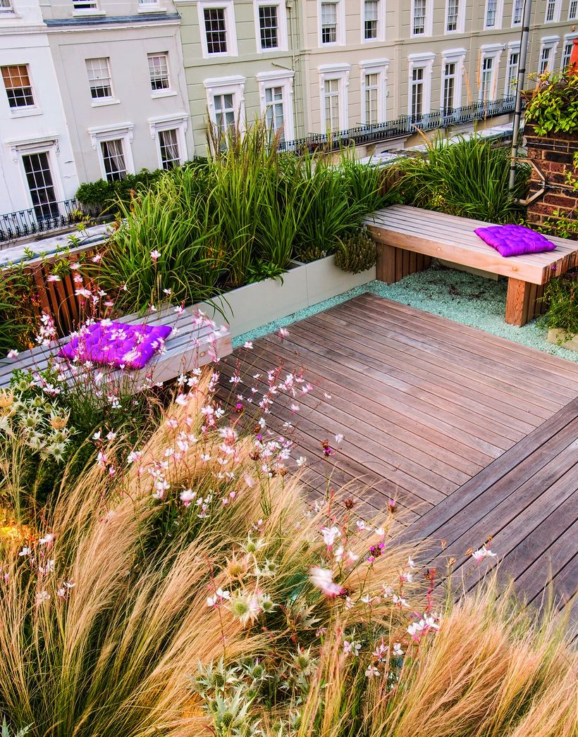 Rooftop-inspiration-for-your-home-can-be-by-using-a-wooden-pallet-floor-and-planted-with-grennery-to-filter-out-the-dust-and-beautify-your-rooftop