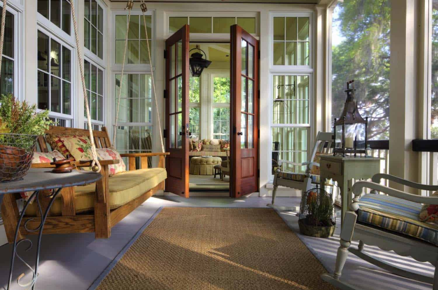 Screened porch design ideaswith swing wooden bed and white wooden chairs