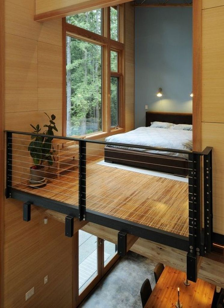 Small loft bedroom with wooden floor
