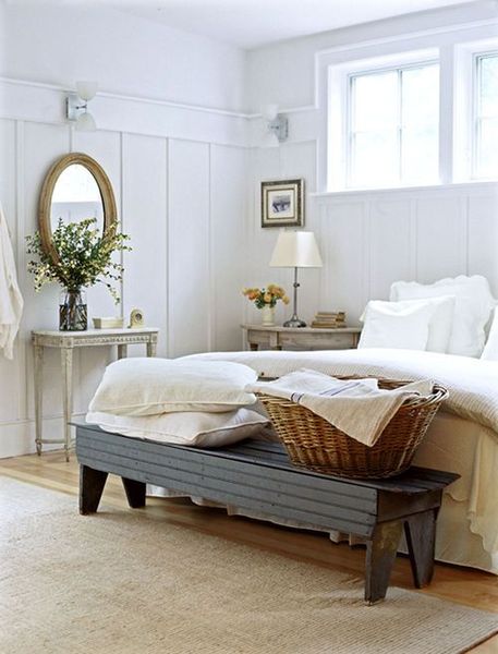 Weathered-wood-nightstands-a-refined-vanity-a-dark-bench.-1
