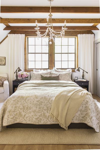Wooden-beams-on-the-ceiling-light-colored-walls.-1