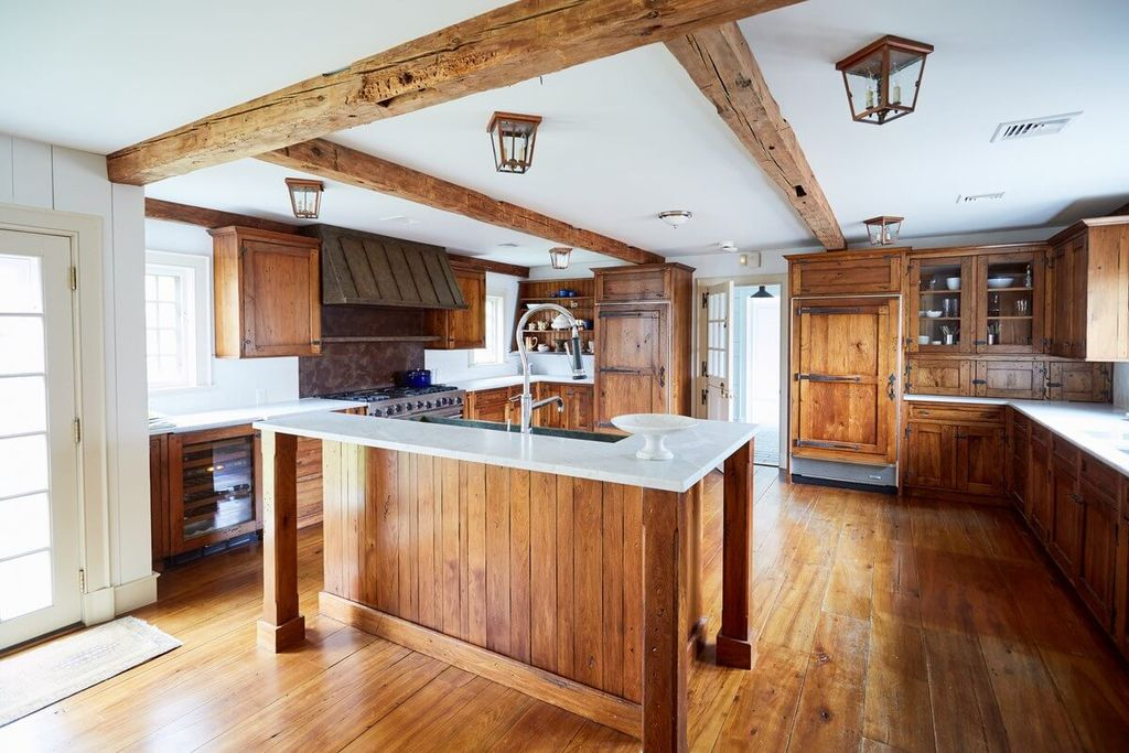 Wooden floor combined with wooden cabinets for farmhouse kitchen