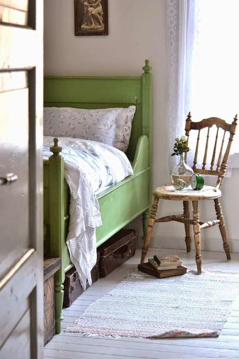 Classic-chair-that-is-used-as-a-night-stand-to-store-house-plant-and-small-clock-to-inspire-your-bedroom-vintage-design