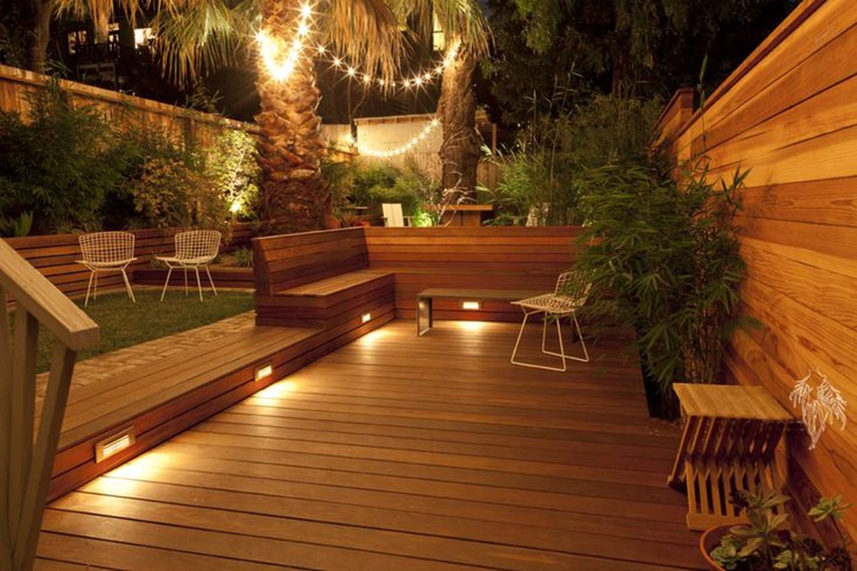 Decorative-lighting-by-connecting-led-lights-from-one-tree-to-another-in-order-to-create-good-lighting-on-your-rooftop
