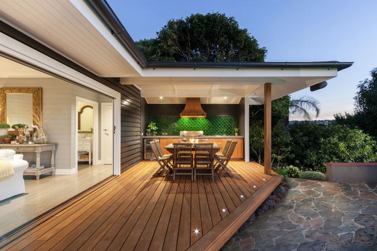 Decorative-lighting-on-backyard-patio-deck-design-with-wooden-dining-table-and-add-decorative-lighting-applied-to-your-patio-floor-to-get-good-light