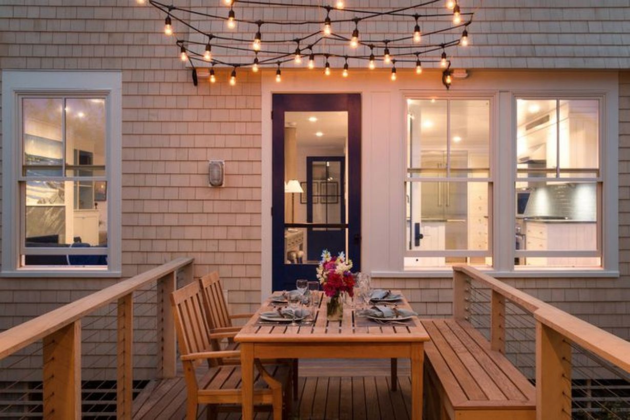 Decorative-lighting-with-light-bulbs-that-are-yellow-and-arranged-in-order-to-get-good-lighting-at-night-on-your-backyard-patio-deck
