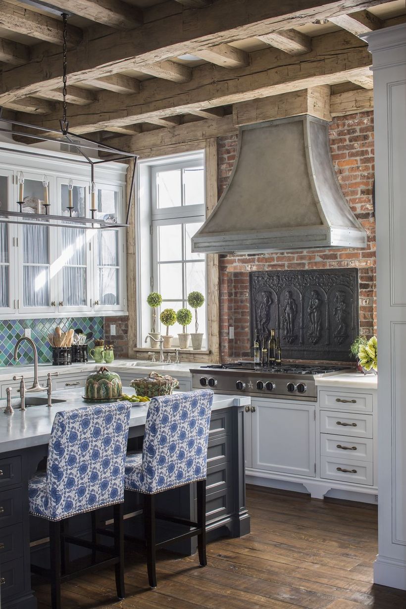 Inspired-kitchen-that-integrates-with-a-boho-style-table-with-a-unique-pattern-of-blue-base-chairs-to-make-it-look-attractive-in-your-kitchen