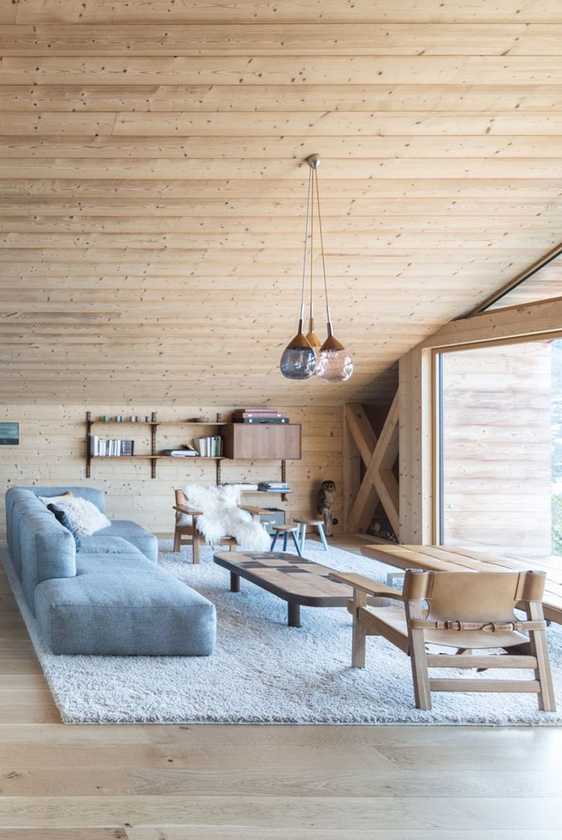 Large-wooden-coffee-table-and-wooden-hanging-rack-to-store-book