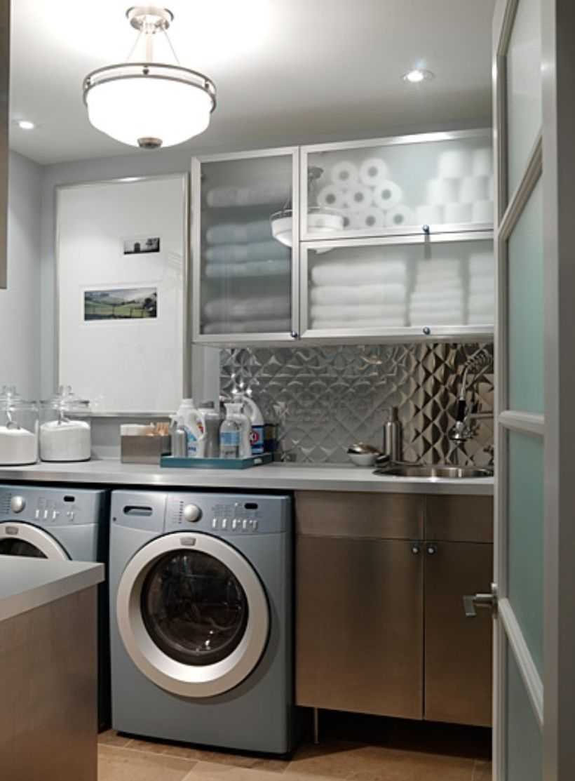 Laundry room with dark gray cabinet