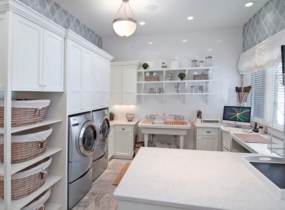 Laundry room with multi level storage and white cabinet