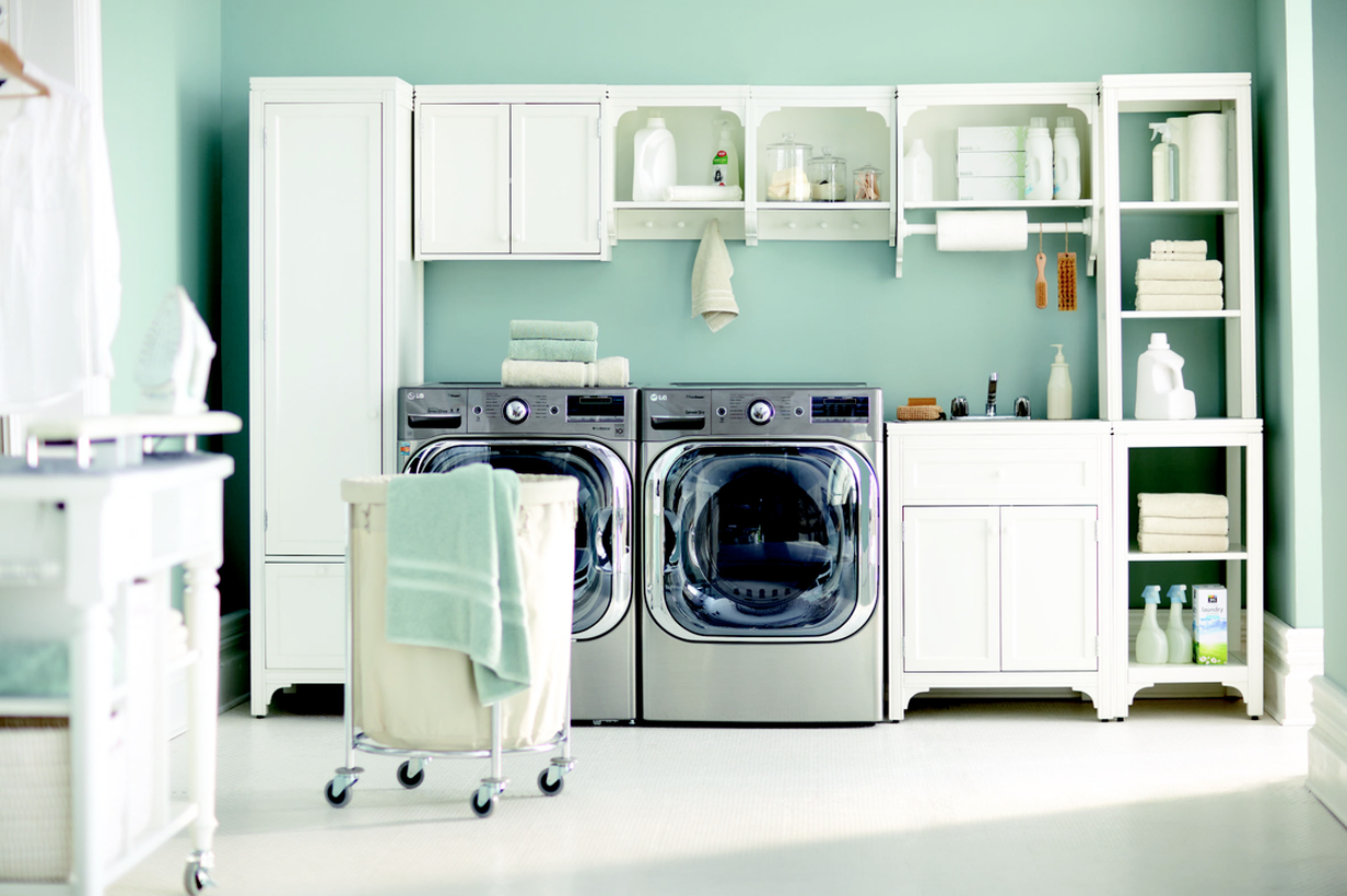 Laundry room with white cabinet and white rack decoration