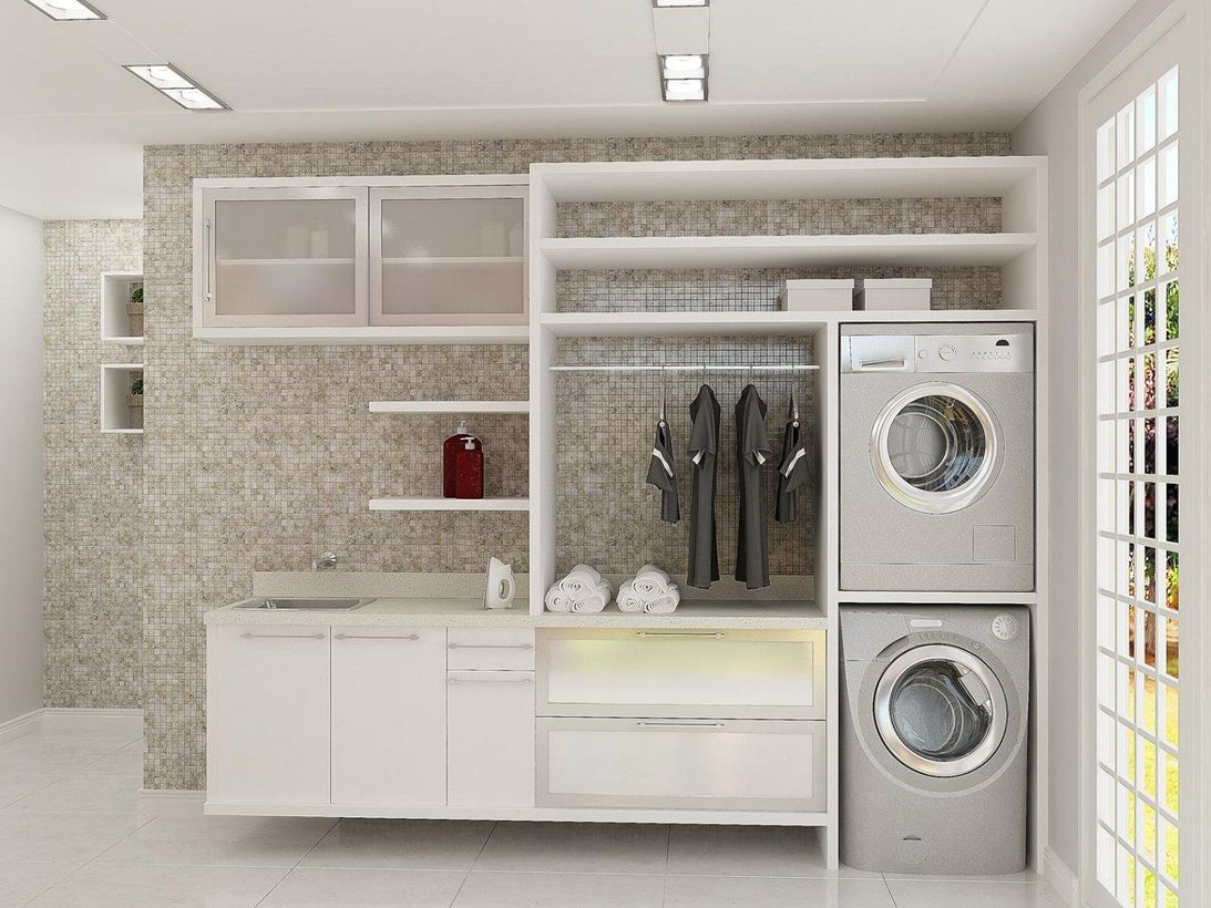 Laundry room with white white cabinet and white rack