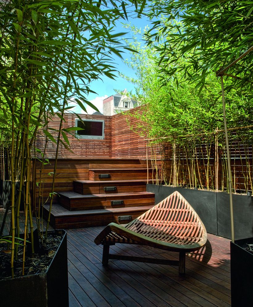 Minimalist-comfortable-rooftop-surrounded-by-some-greenery-will-make-it-cool-and-calm