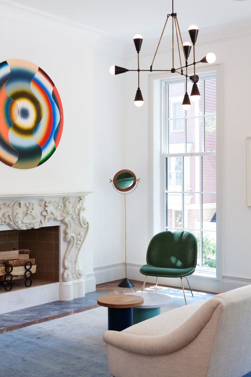 Minimalist-round-coffee-table-and-brown-chair