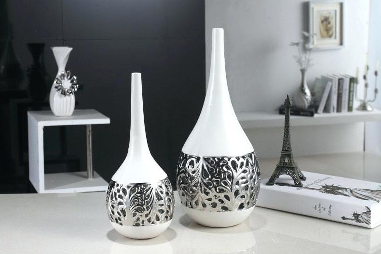 Modern-flower-vase-living-room-ornaments-with-unique-silver-and-white-carvings-for-decorating-your-living-room-table